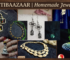 A collection of photos showing homemade jewelry on a wooden background with "KHATIBAAZAAR | Homemade Jewellery" at the top. The jewelry includes silver and beaded earrings and necklaces.