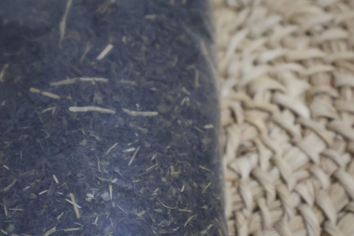 Authentic organic green tea from Sreemangal Bangladesh dry leaves texture